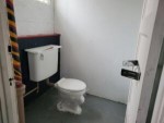 Basement toilet room